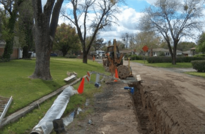 Photo of trench for backyard water main