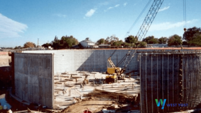 Photo of water storage tank under construction with crane