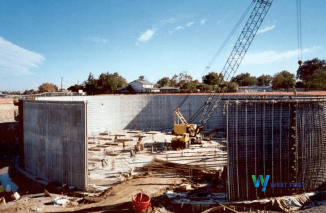 Photo of water storage tank under construction with crane