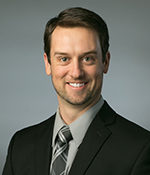 headshot of employee Adam Brown